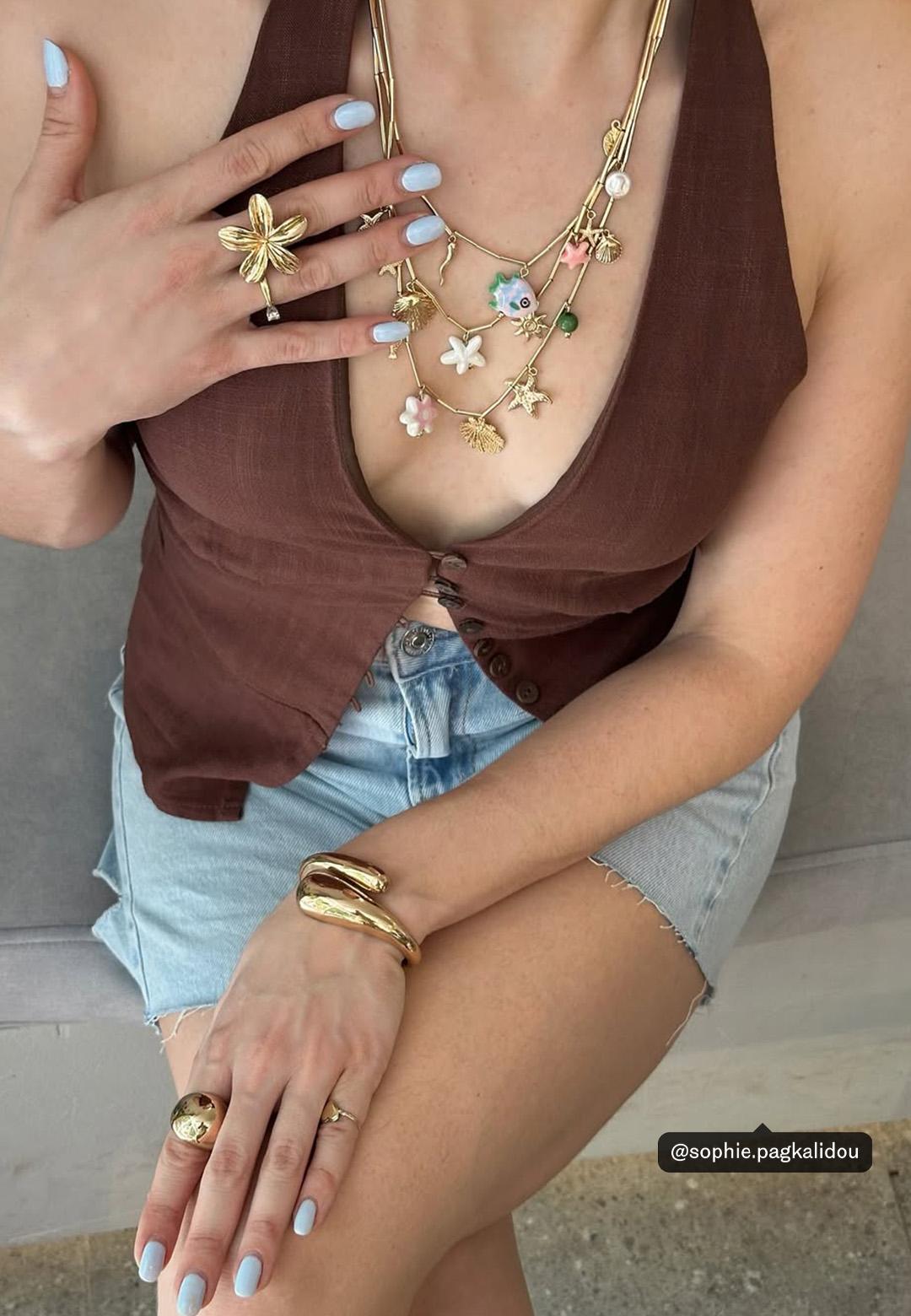 Rigid arm cuff — Gold