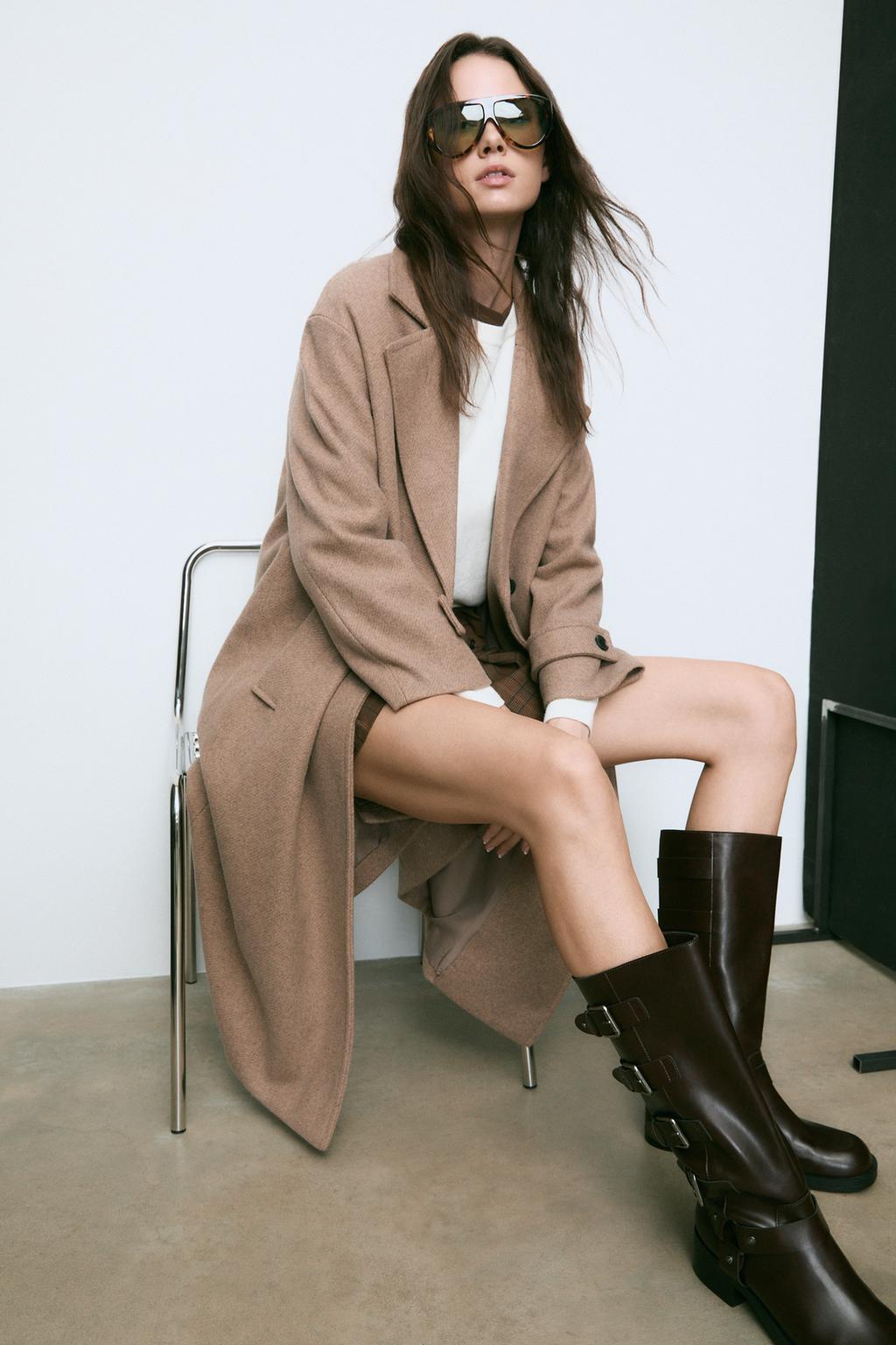 Flat distressed boots with buckles