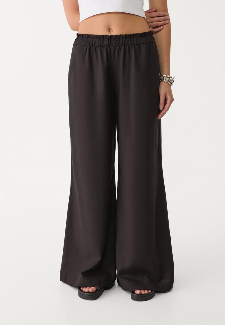 pantalon palazzo fluido con lino