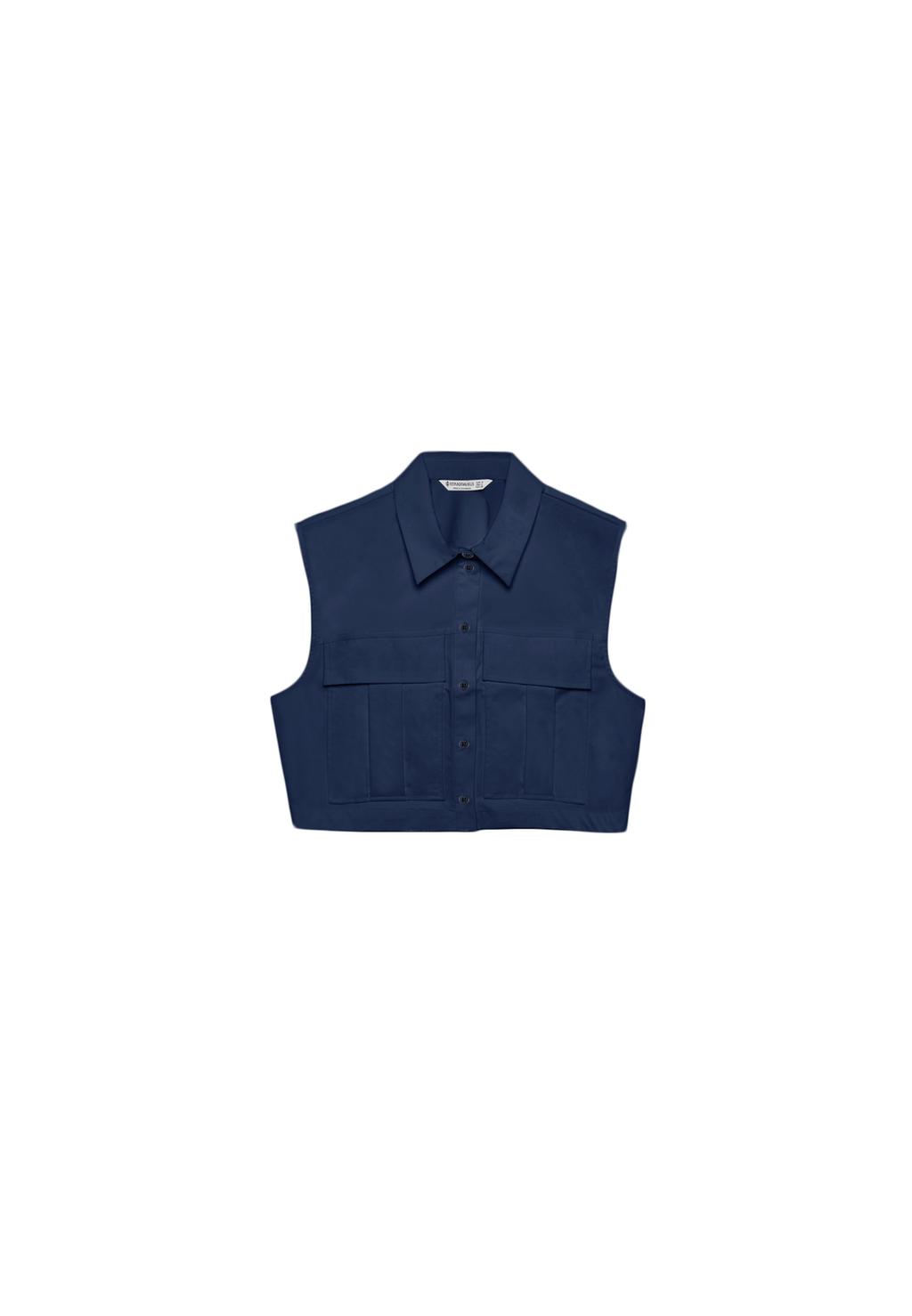 Chemise sans manches à poches