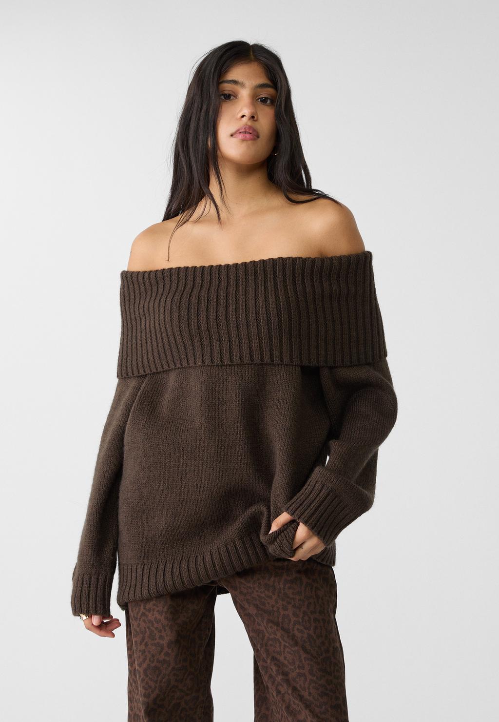 Exposed shoulder knit sweater