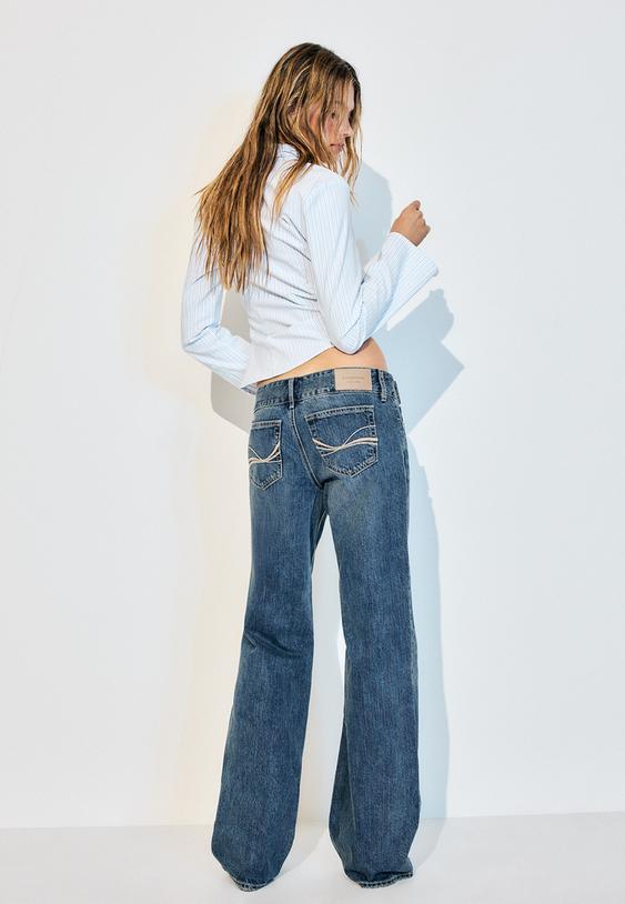 jeans cintura baixa retos com cintura martelo