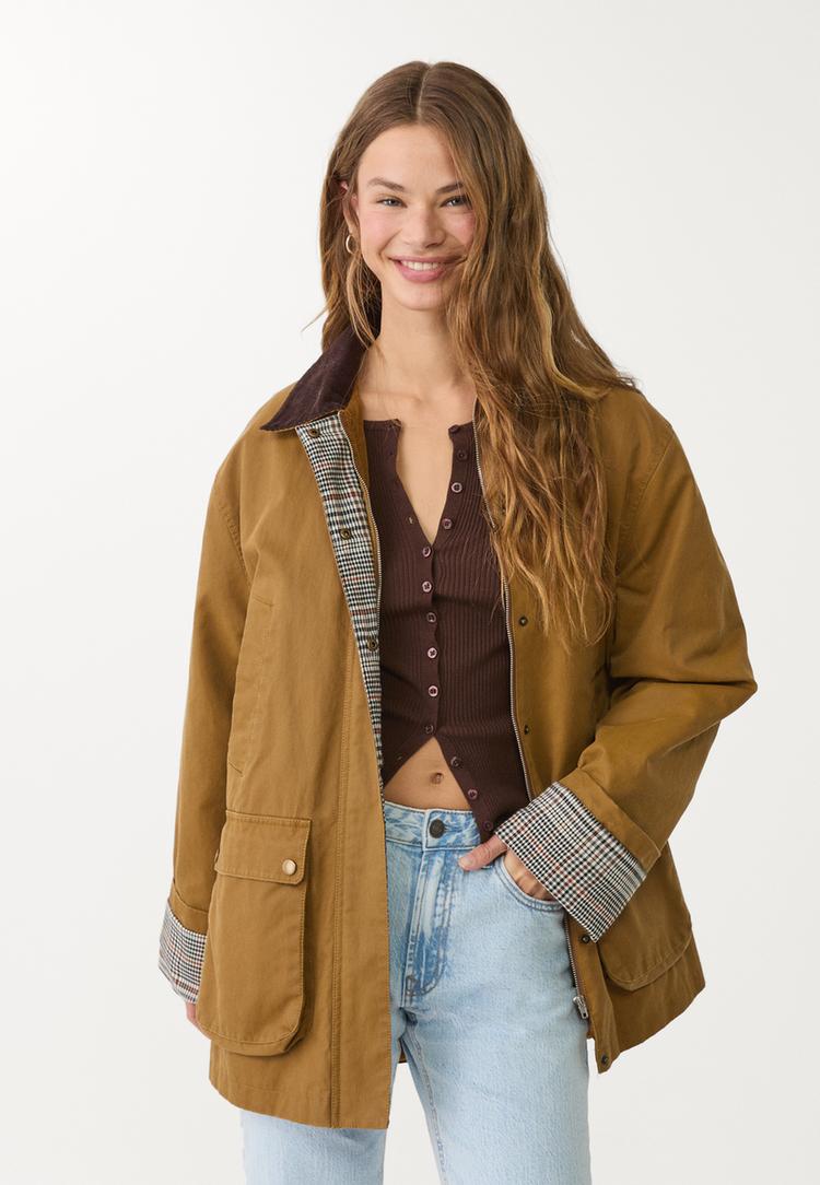 parka encerada multi bolsillos