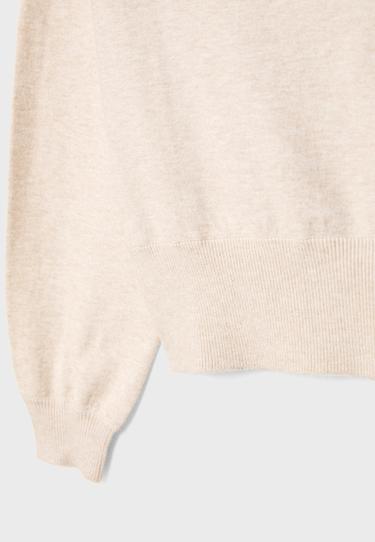 Asymmetric knit jumper — Stone 9