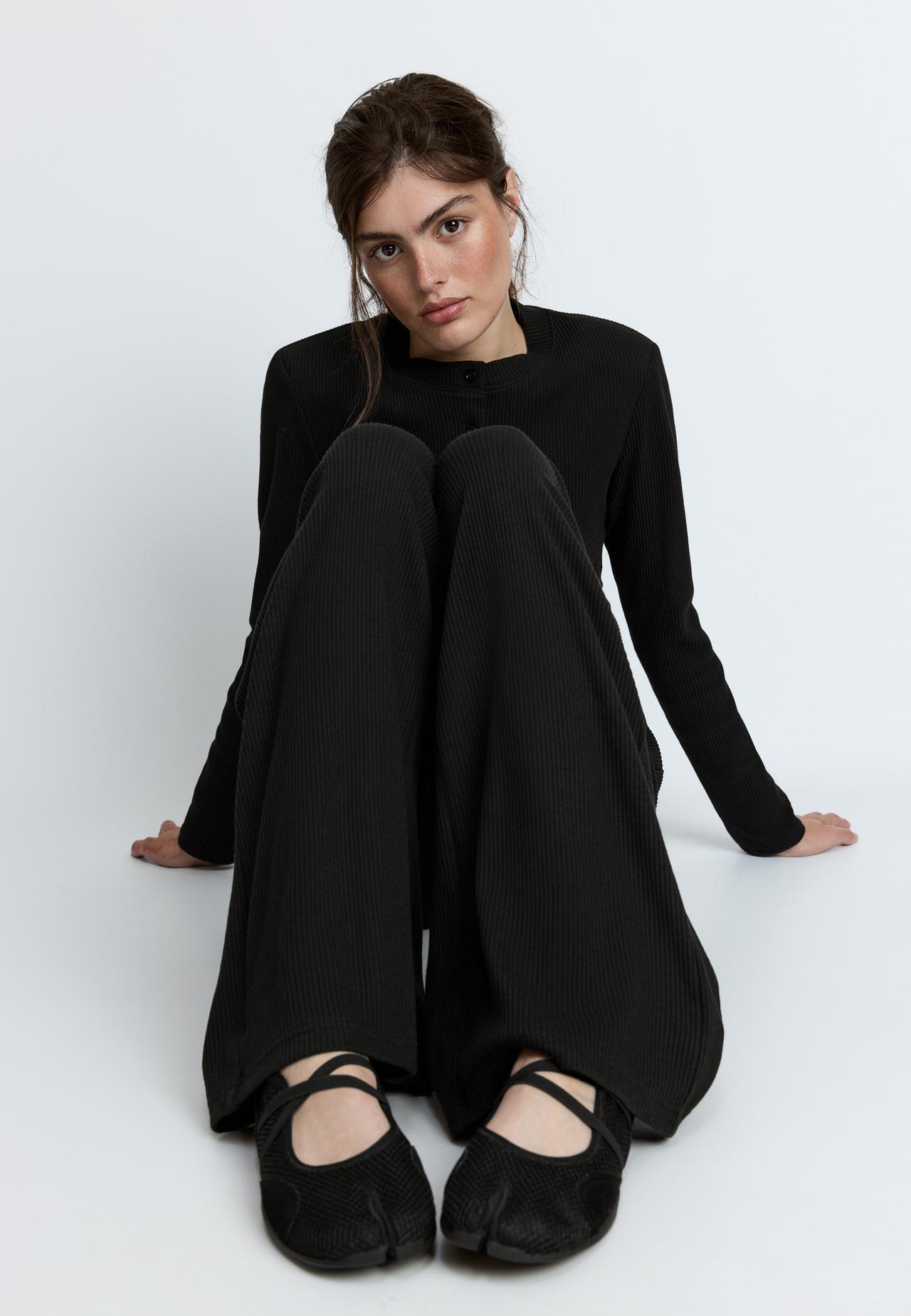 Soft-touch ribbed trousers — Black