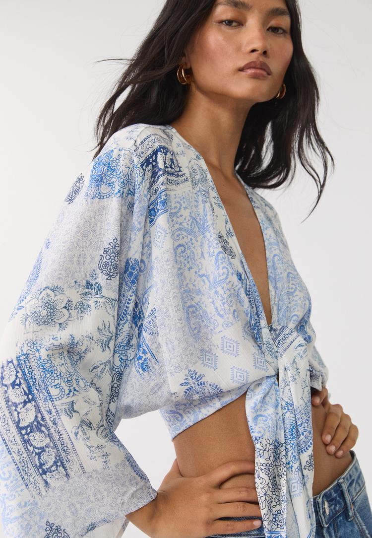 blusa fluida nudo