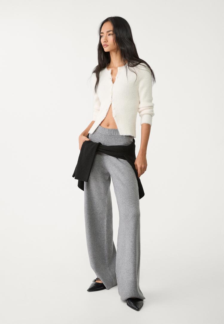 veste avec boutons en fausse fourrure