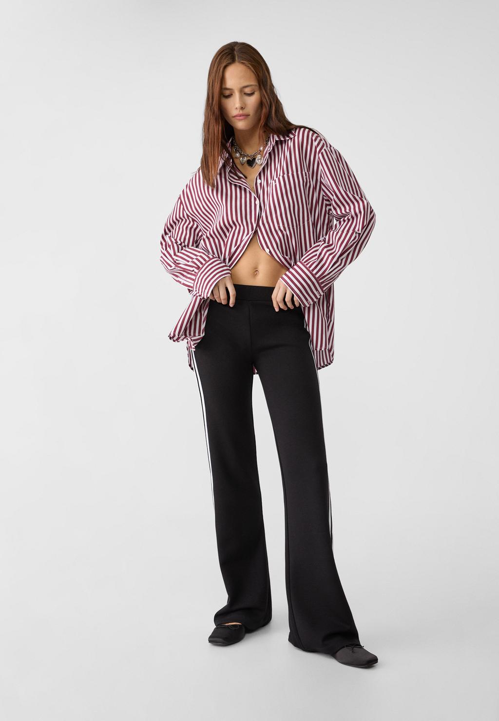 Flared side stripe trousers