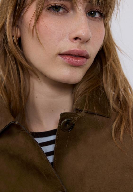 giubbotto con tasche effetto camoscio