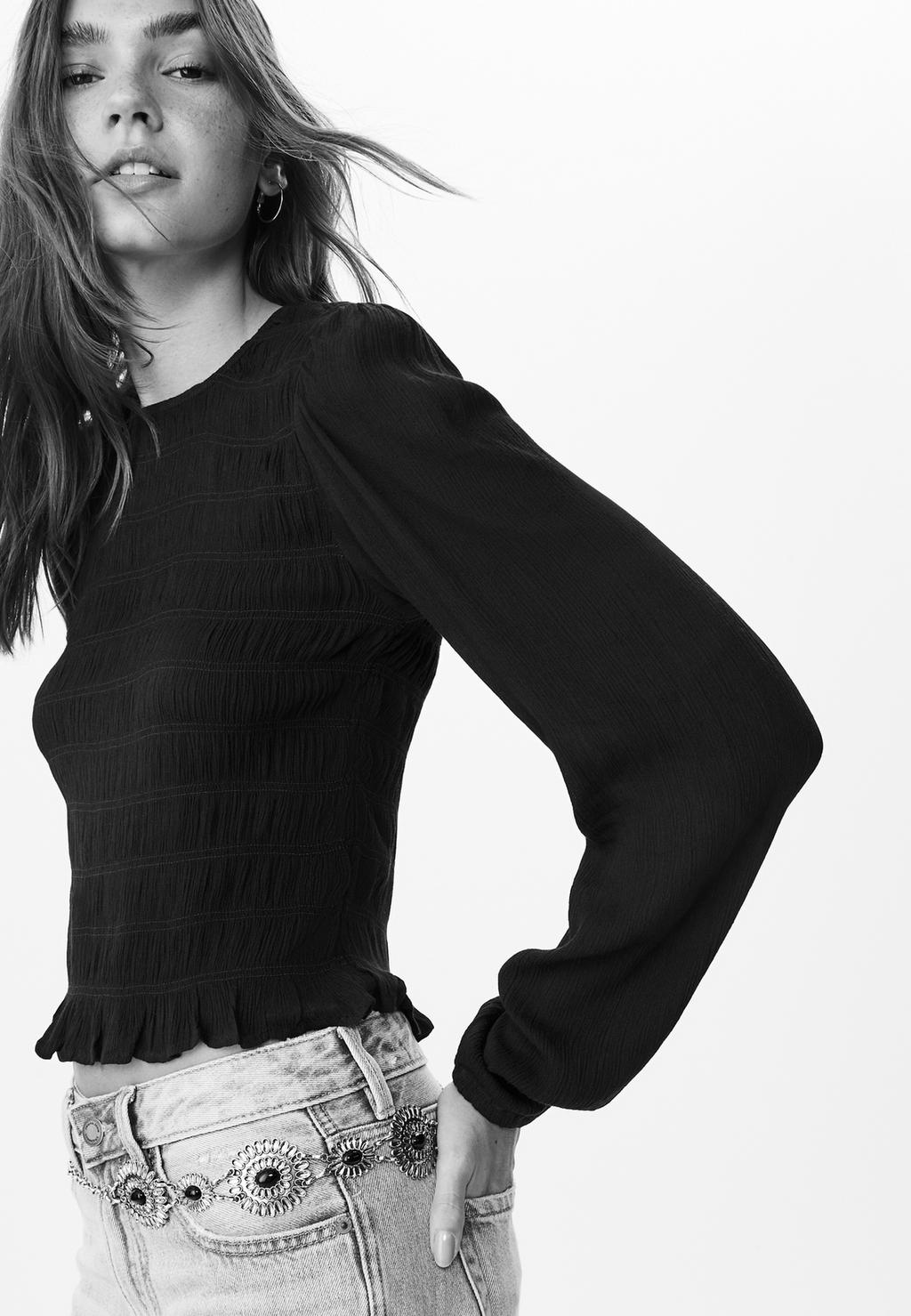 Blusa con volant