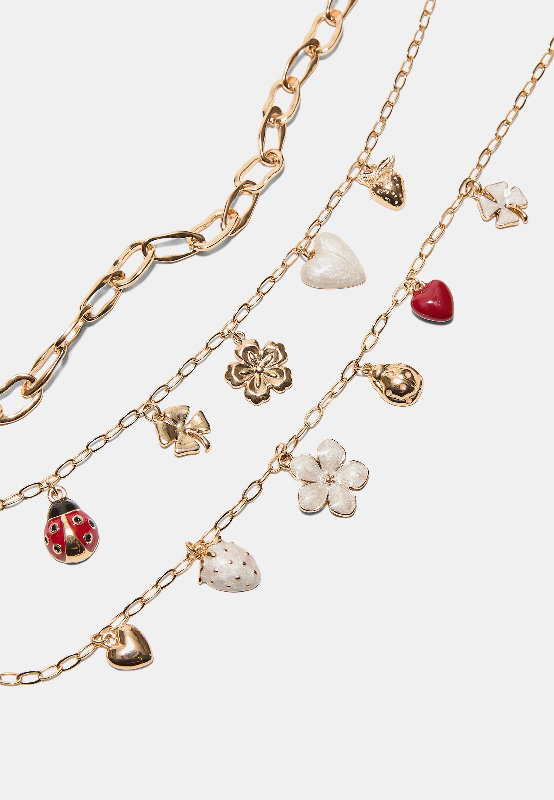 Set of 3 multi-charm necklaces — Gold
