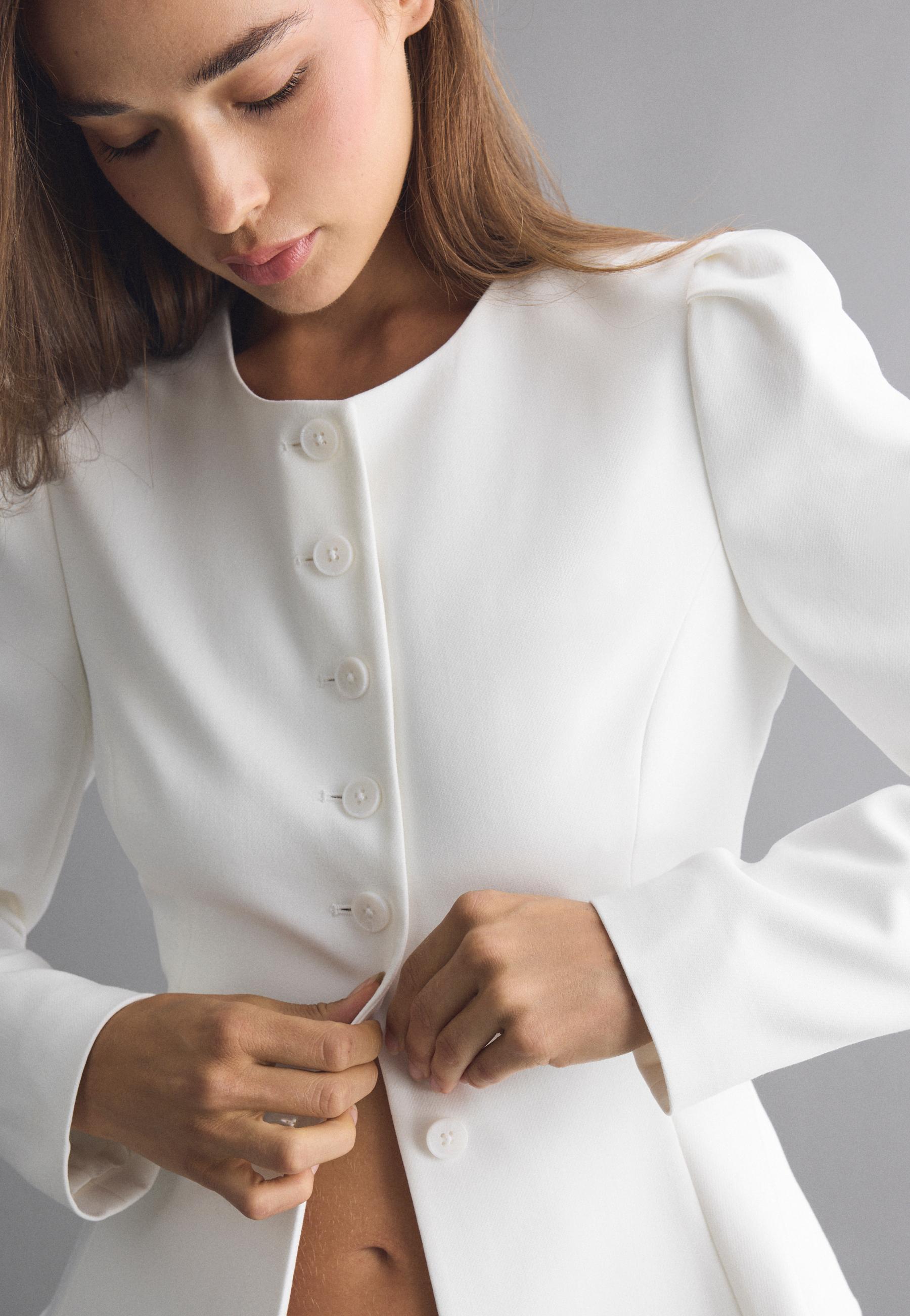 Peplum blazer — Ecru