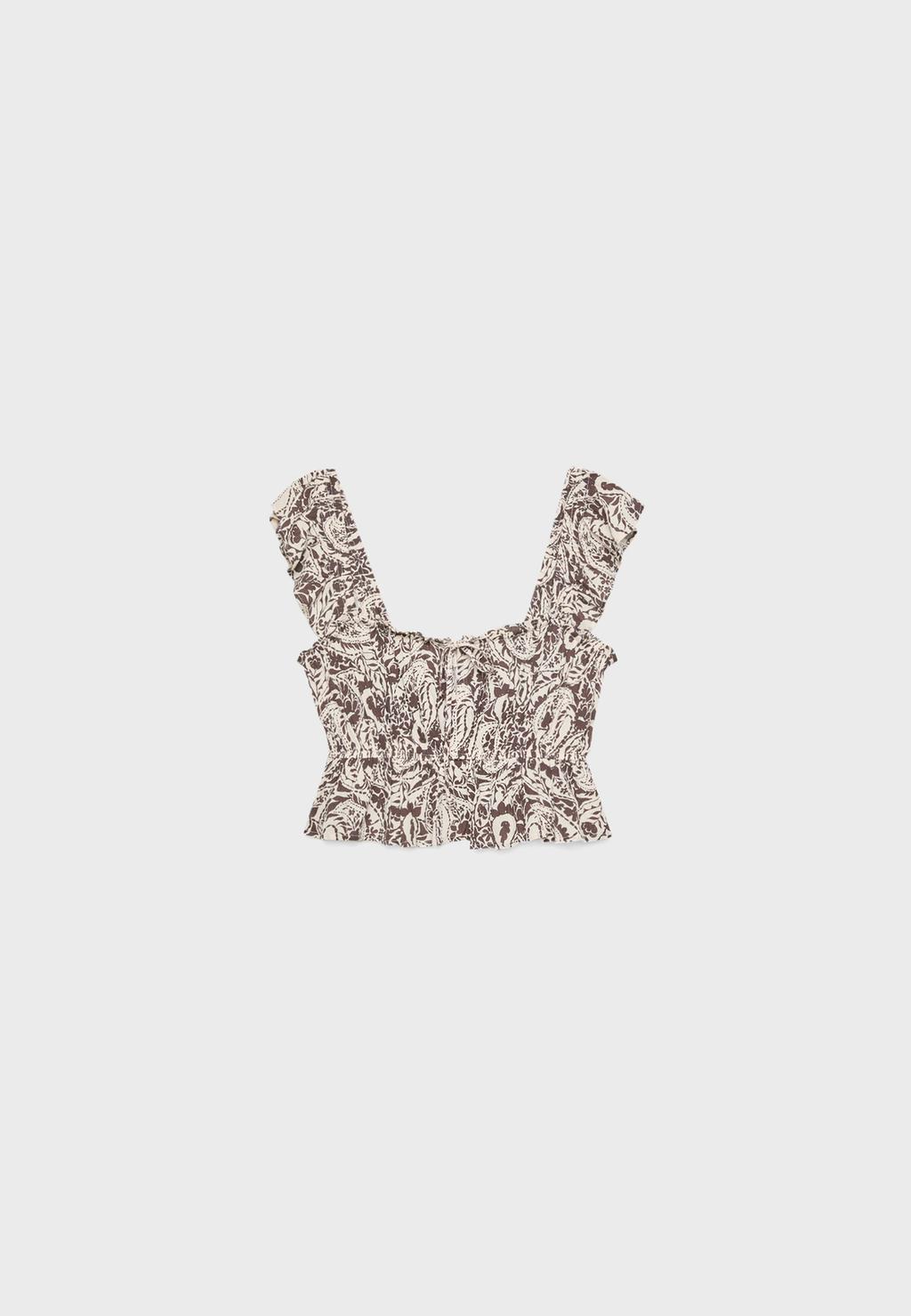 Top fluido volantes estampado
