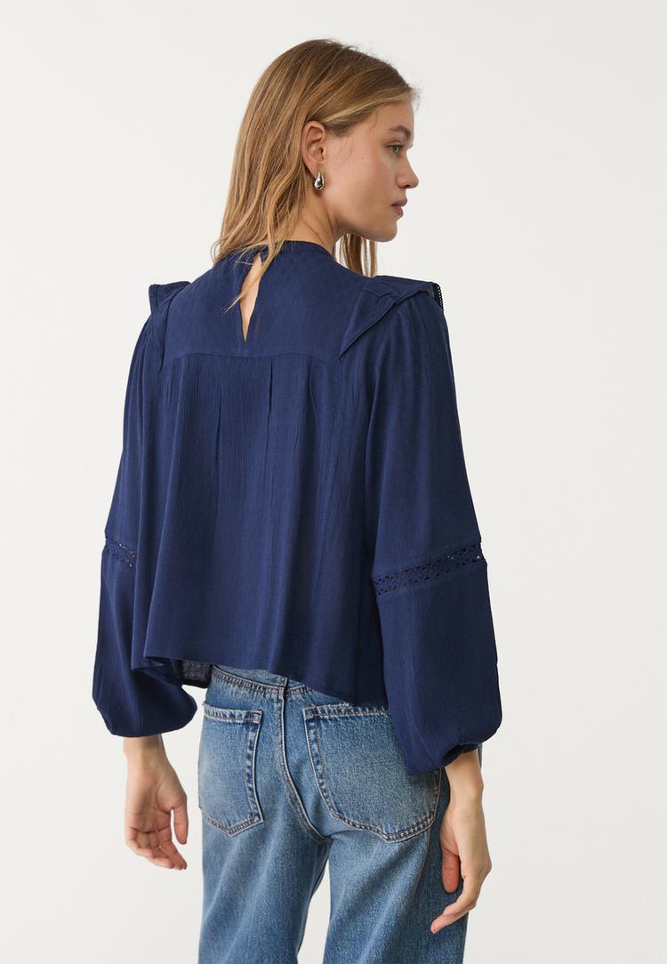 blusa fluida volantes