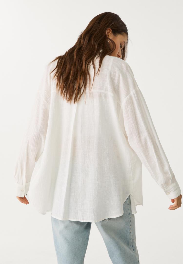 camisa basica fluida bolsillo