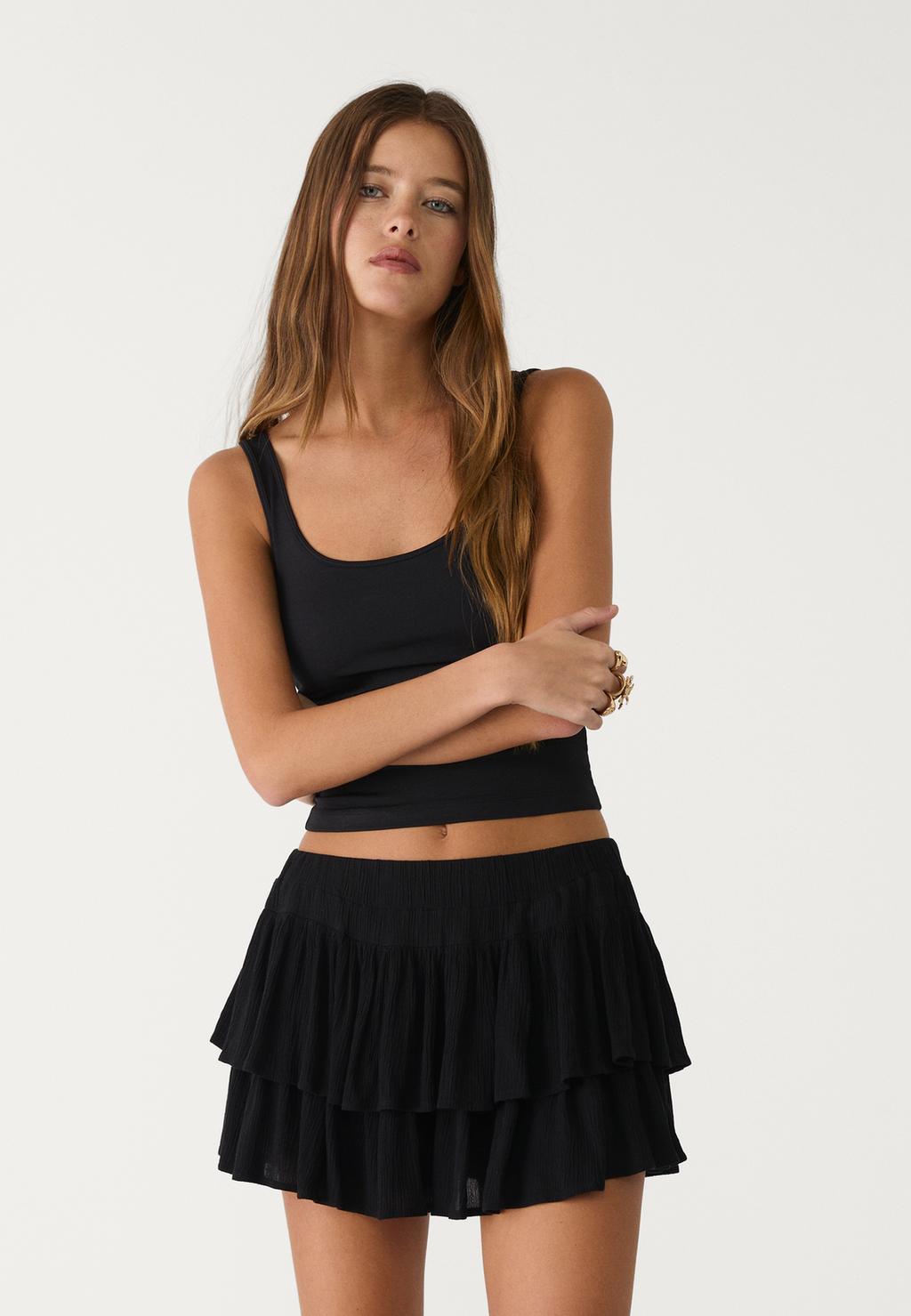 Falda pantalón mini volantes