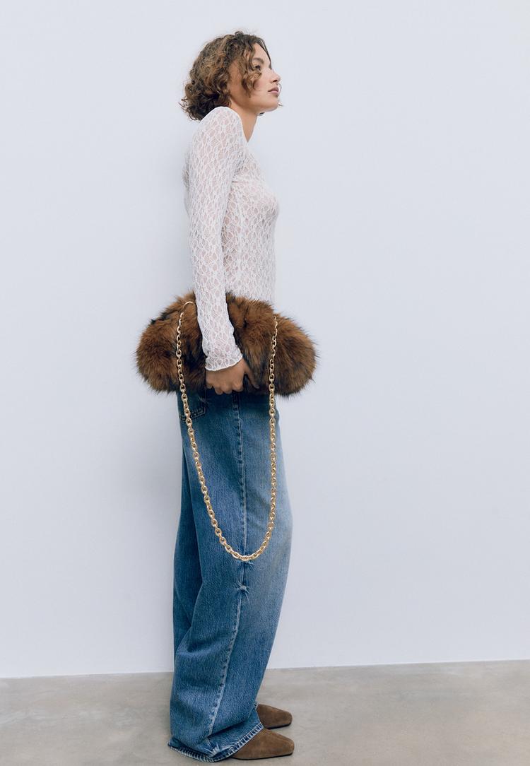 sac seau fausse fourrure chaine