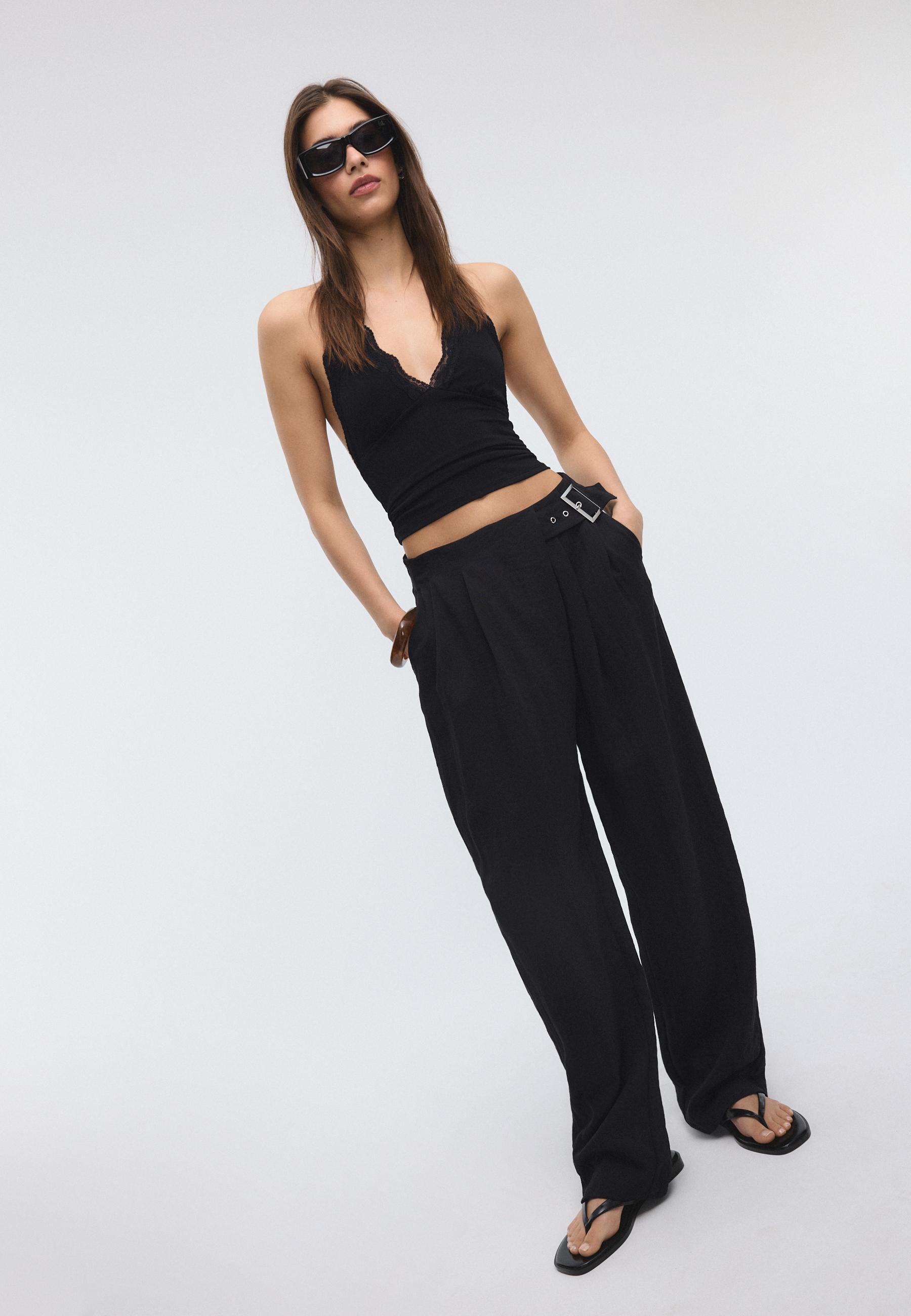 Flowing trousers with a buckle — Black
