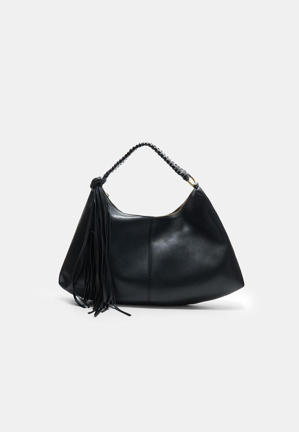 Handbag with fringe and a braided handle