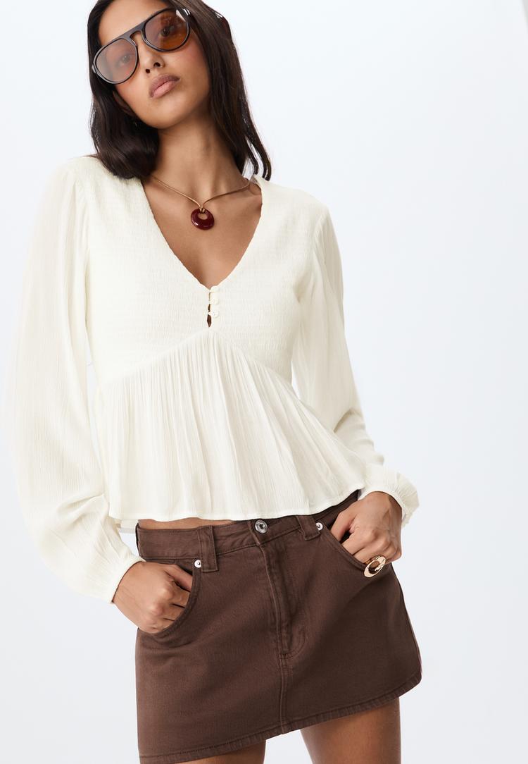 blusa fluida manga larga