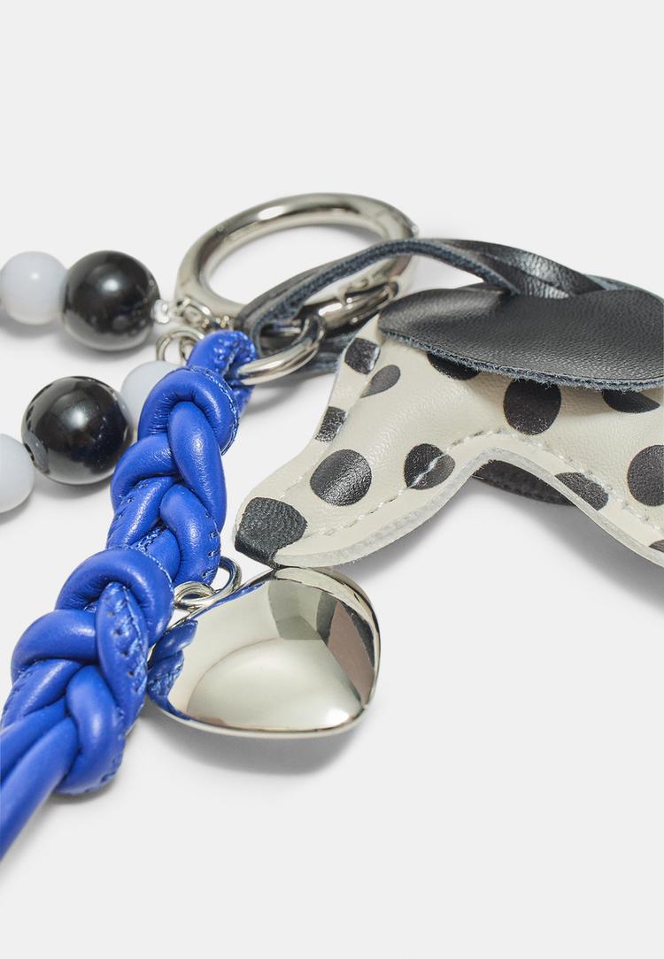 Stradivarius Μπρελόκ Με Γούρι Σκύλο Πουά Λευκό Os φωτογραφία