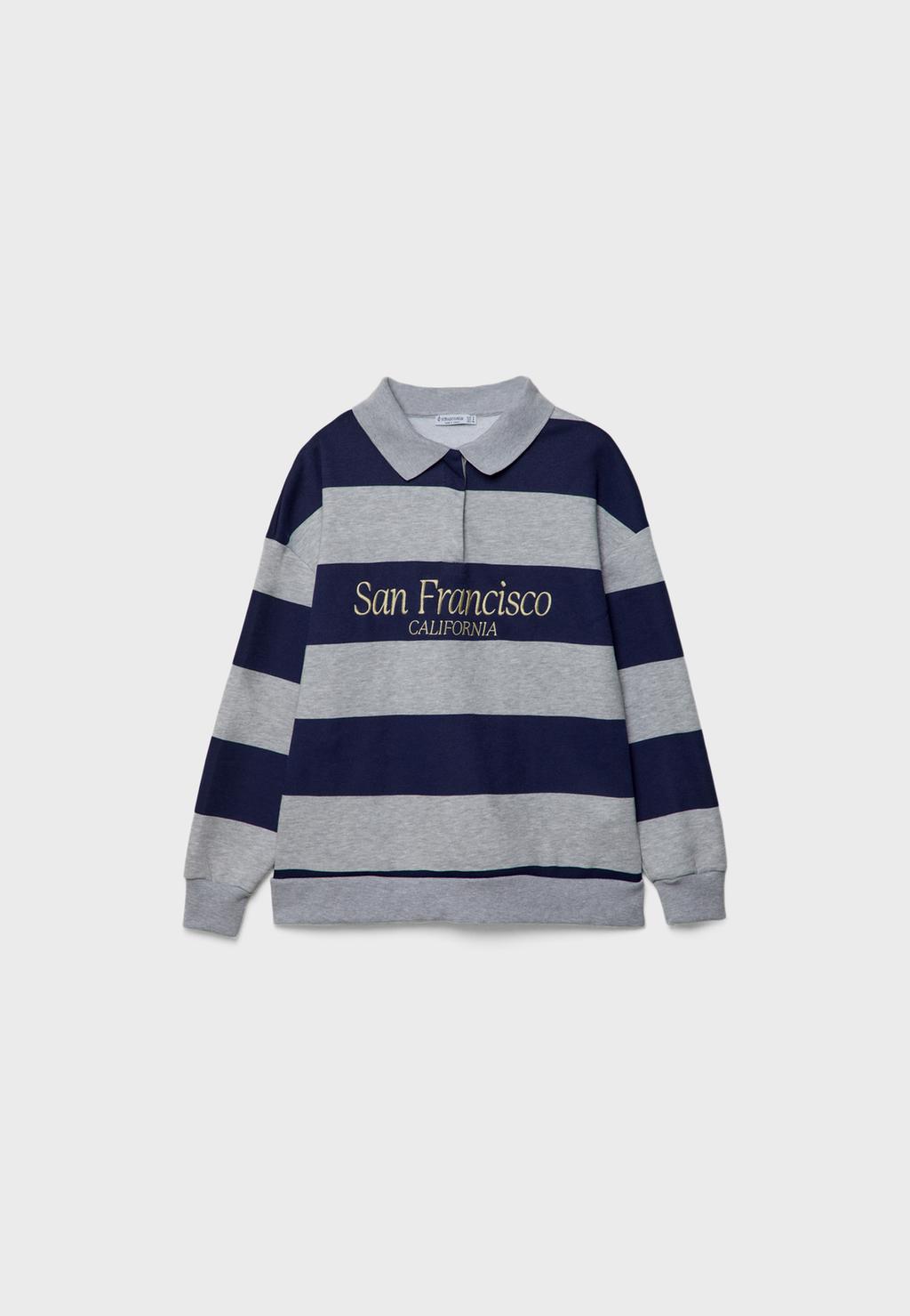 Sudadera polo rayas bordados