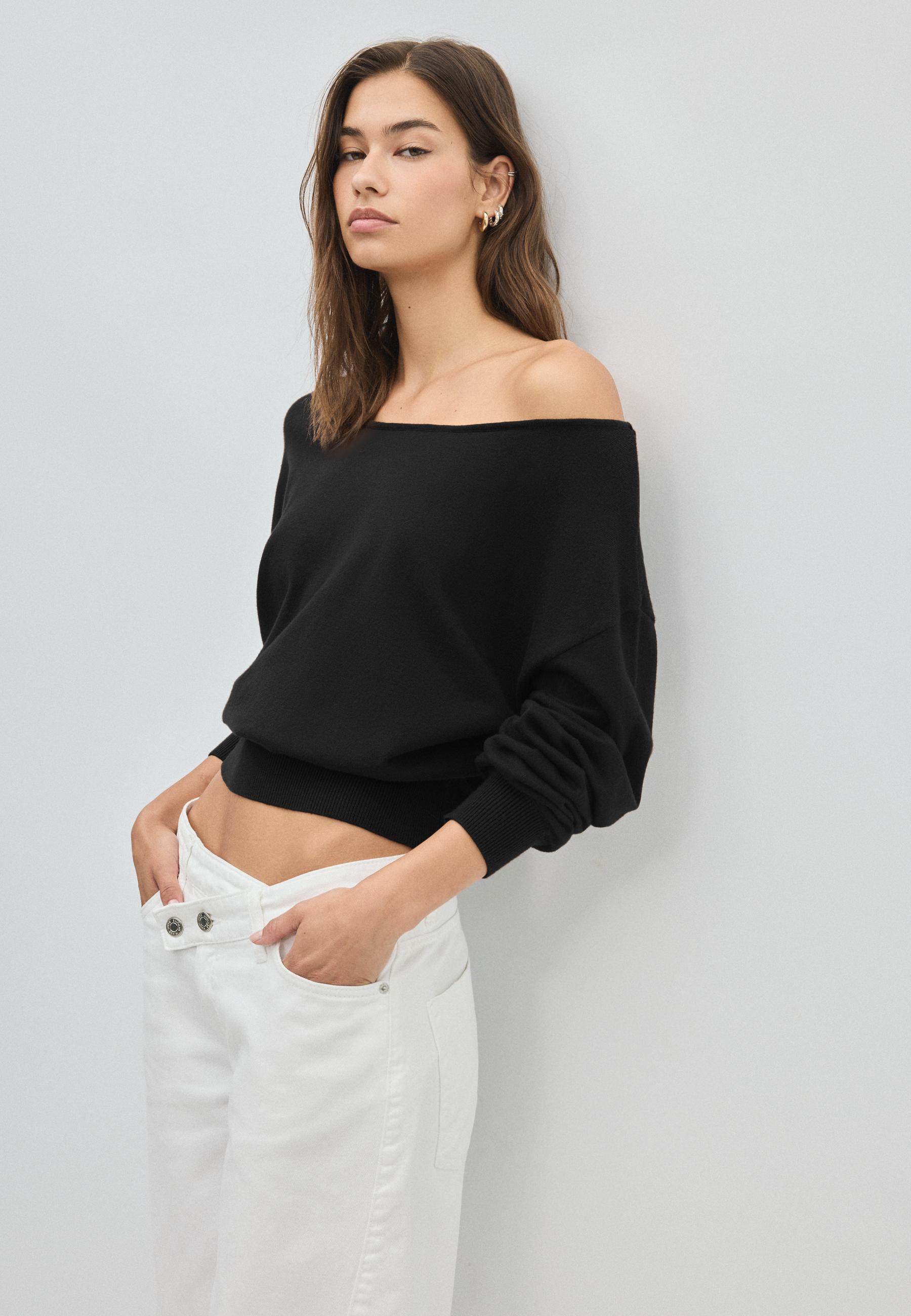 Asymmetric knit sweater — Black