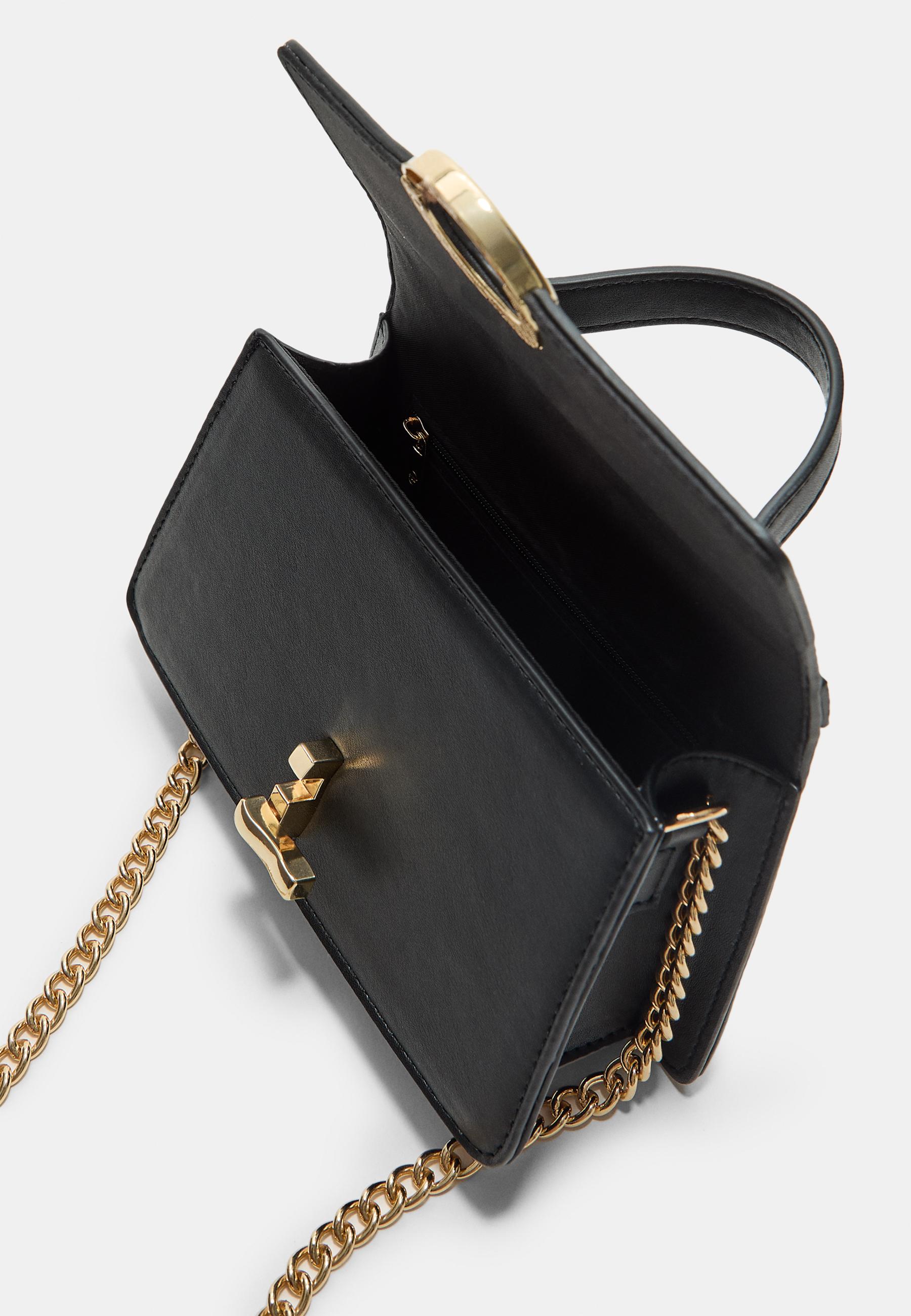 Round-clasp shoulder bag — Black
