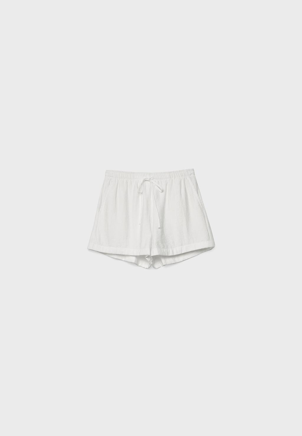 Shorts fluido textura