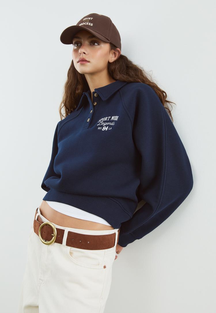 sweat shirt polo a boutons