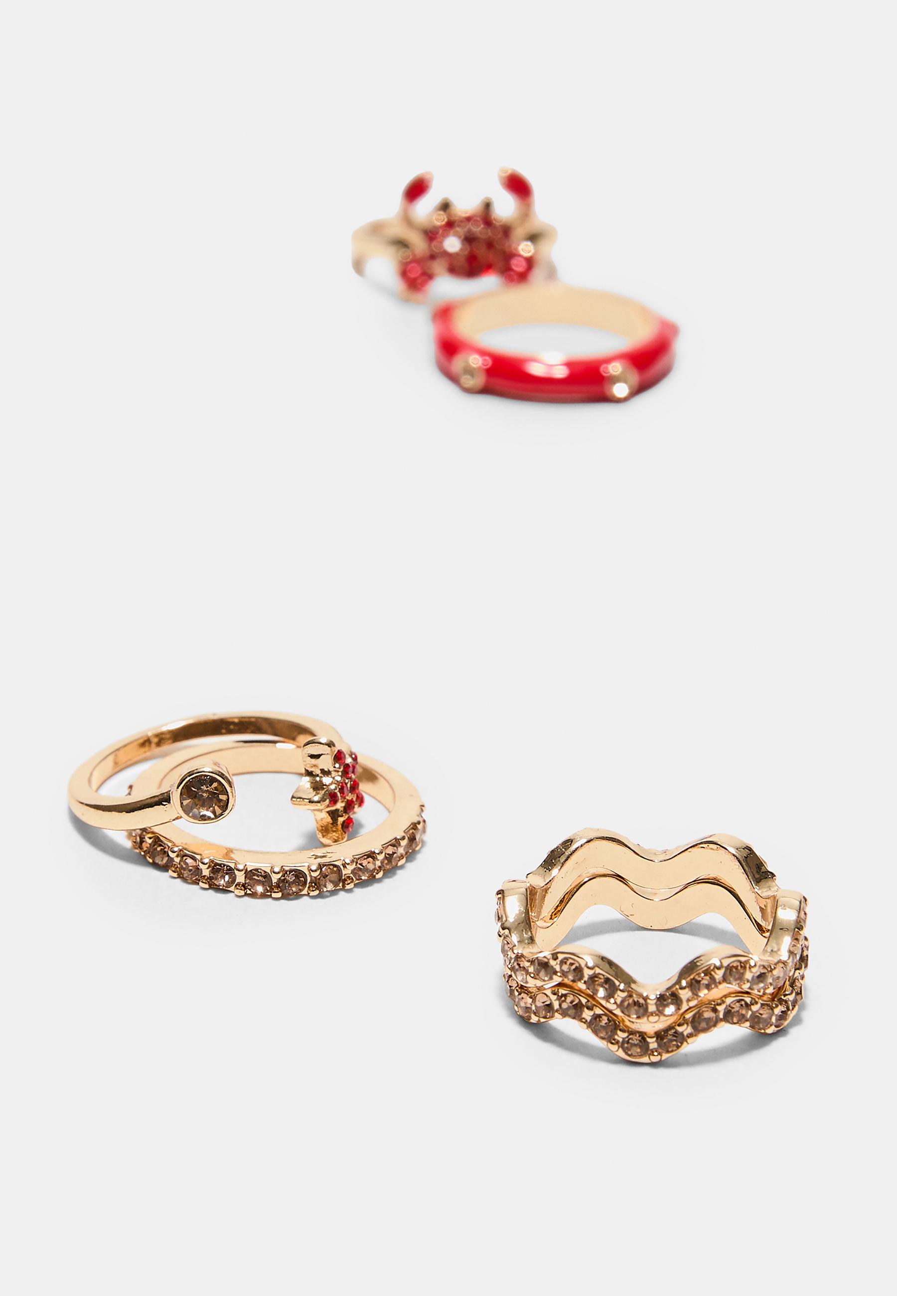 Set of 7 shimmery crab rings — Red