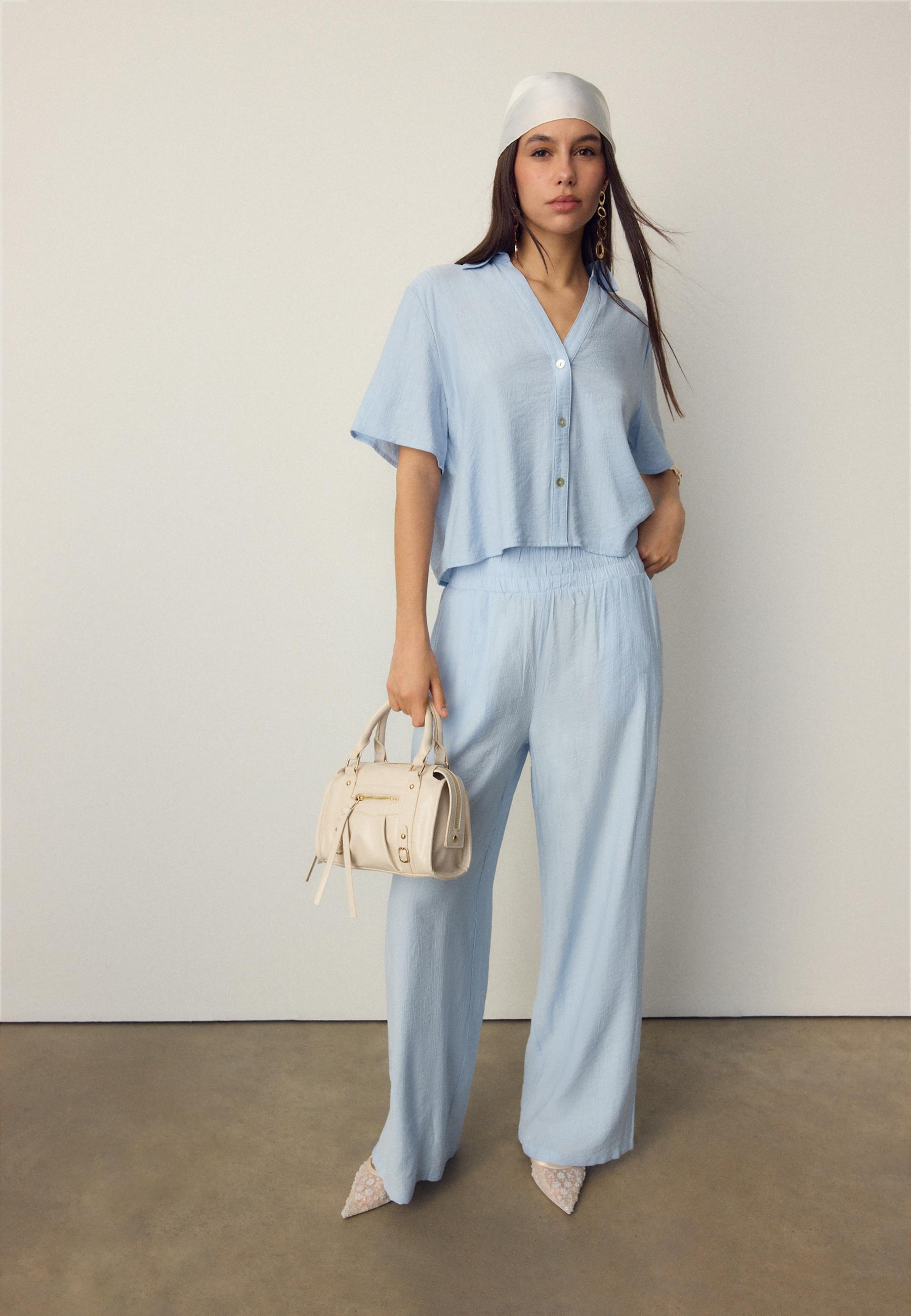 Düğmeli dökümlü gömlek