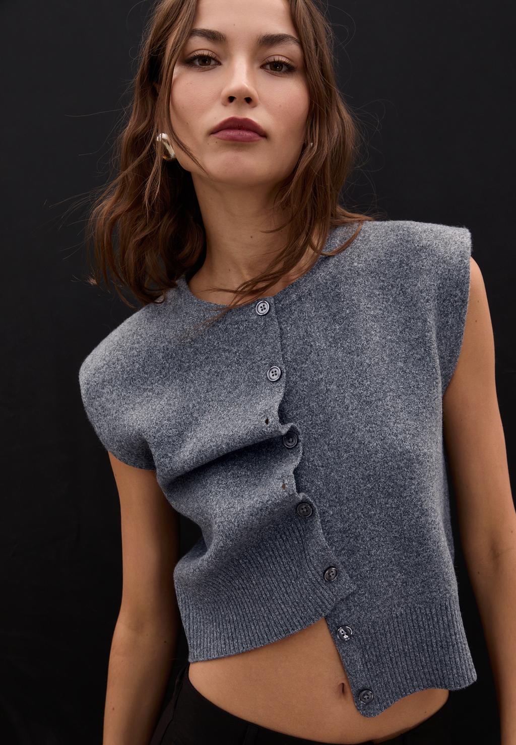 Knit vest with padded shoulders