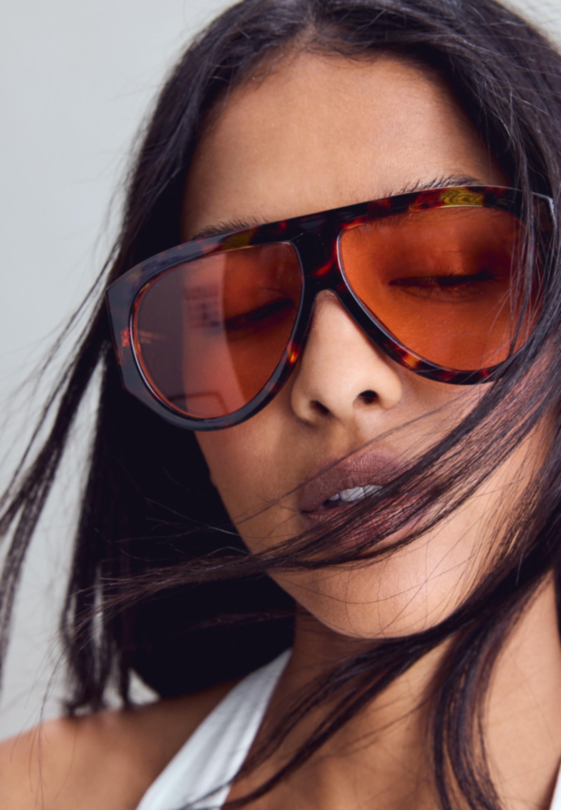 Tortoiseshell-effect sunglasses — Orange
