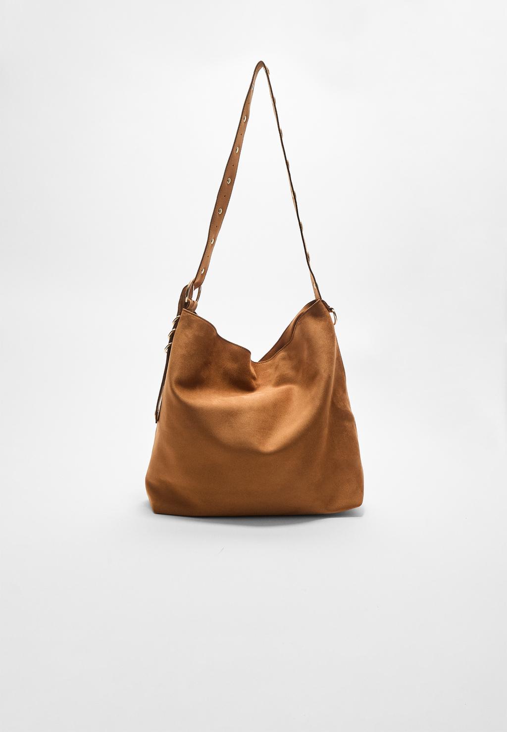 Faux suede bucket bag with strap detail