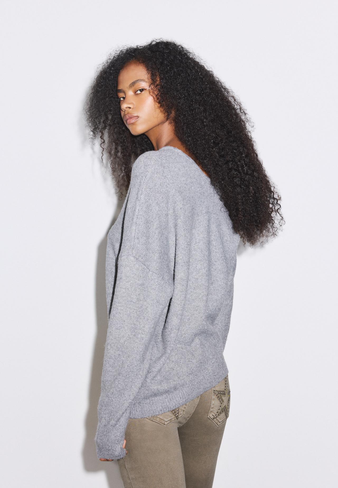 Asymmetric knit jumper — Grey