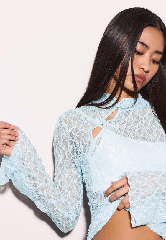 maglietta in pizzo a maniche lunghe