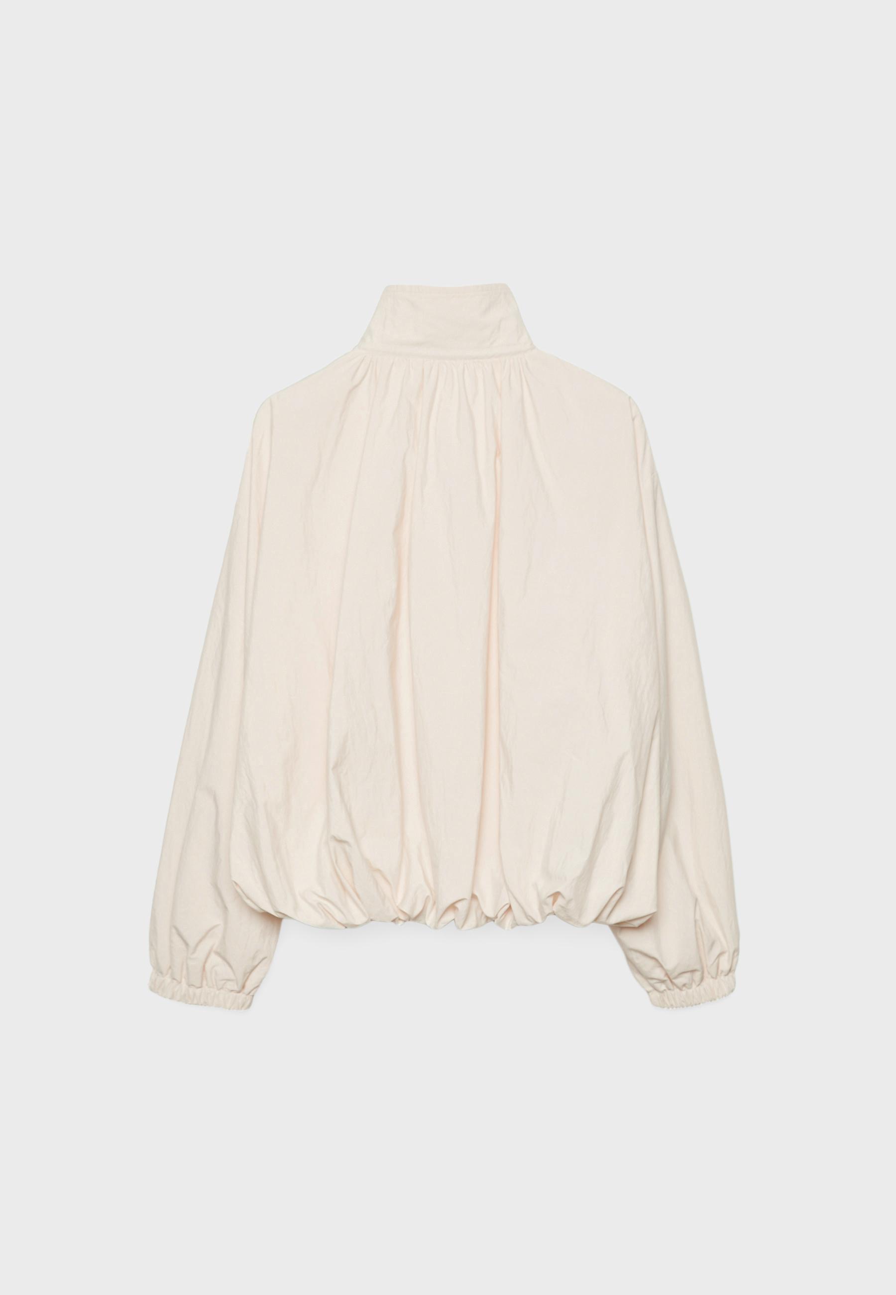 Technical high neck jacket — Ecru