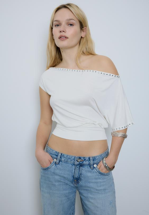 maglietta asimmetrica borchie