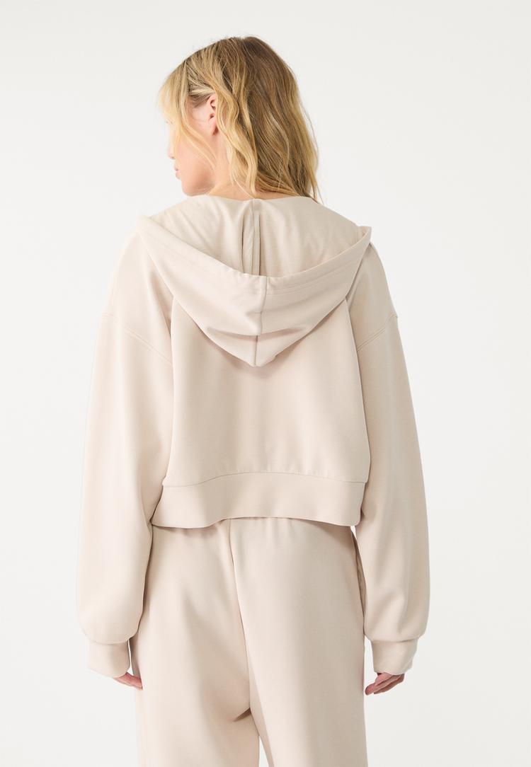 chaqueta con capucha tacto suave