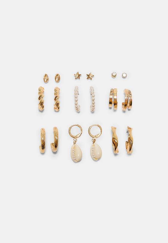 set 9 pendientes caracola