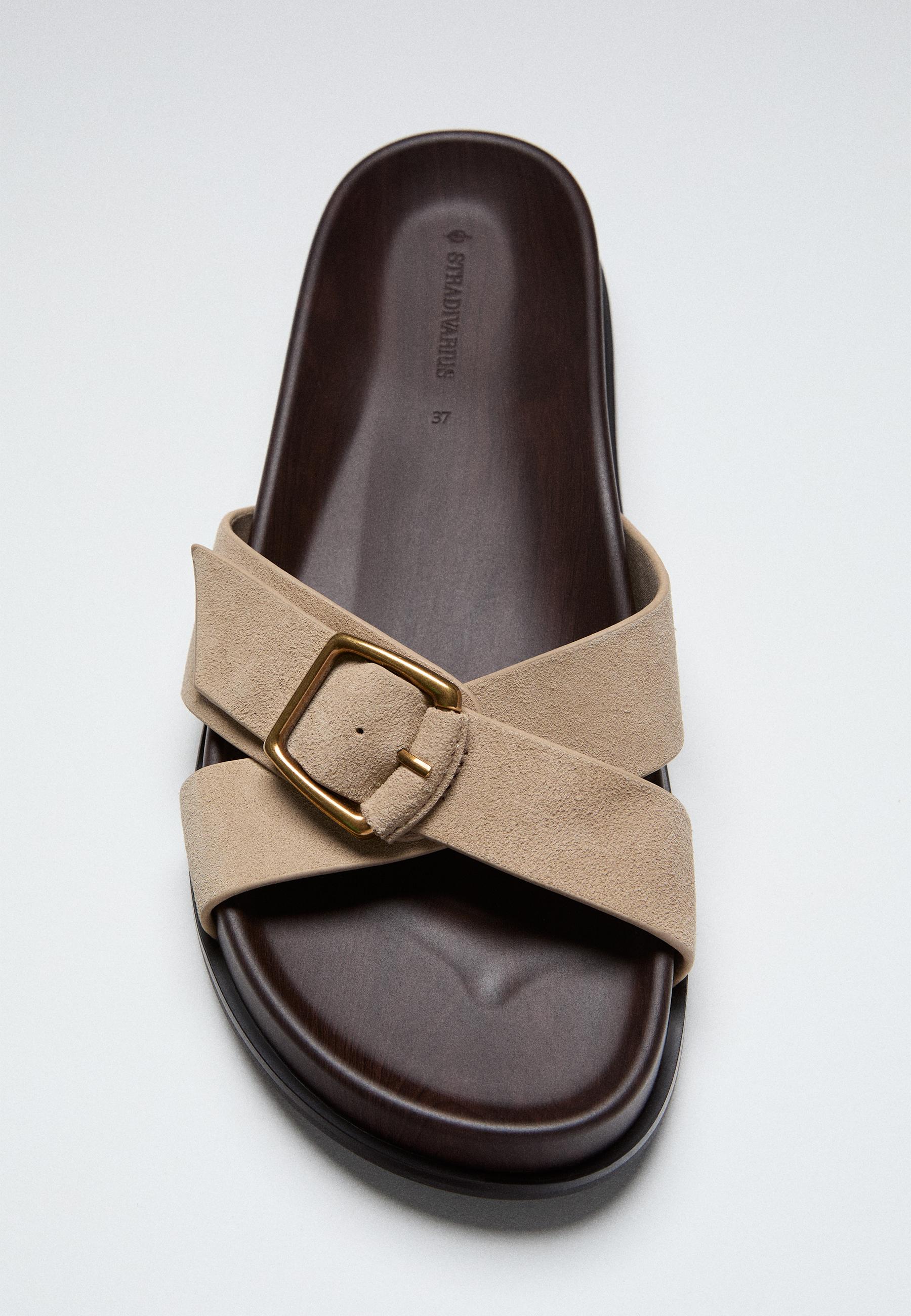Flat crossed leather sandals — BEIGE