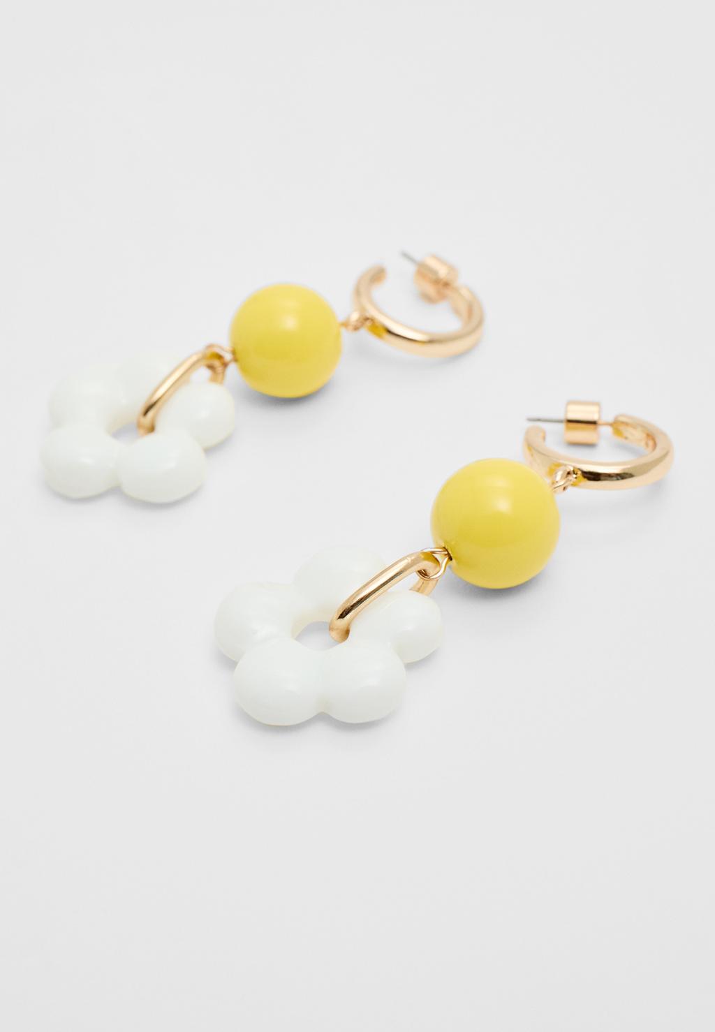 Longues boucles d’oreilles fleur