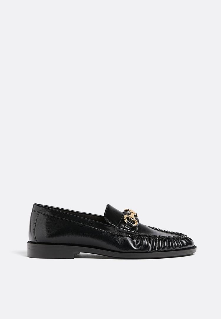 loafers with decorative detailing