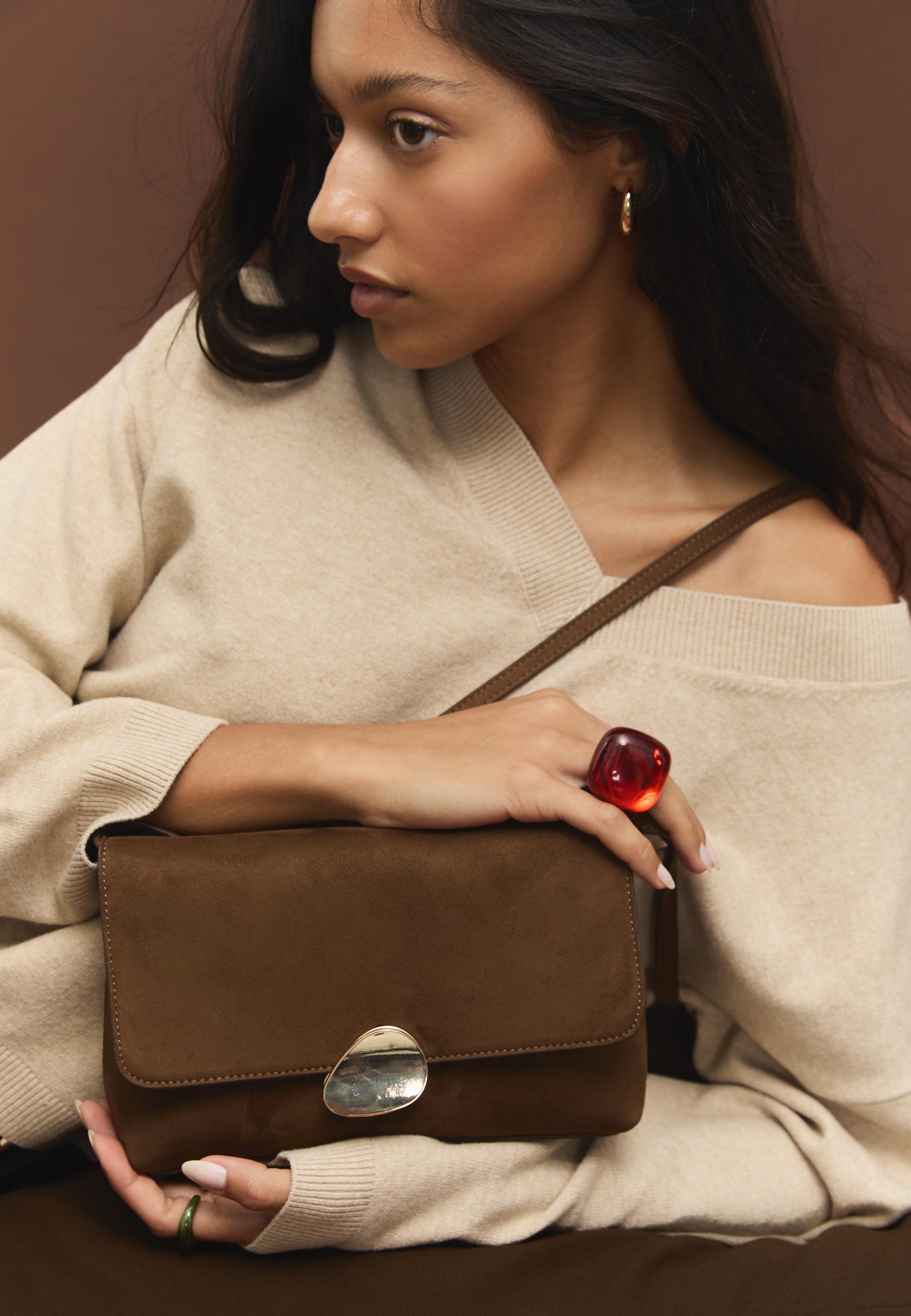 Asymmetric faux suede bag with metal clasp — Brown