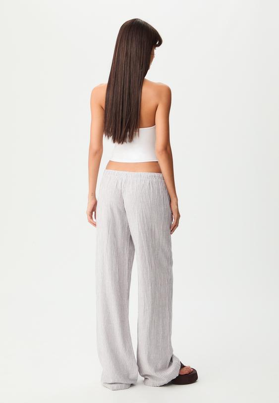 pantaloni fluidi a righe con lino