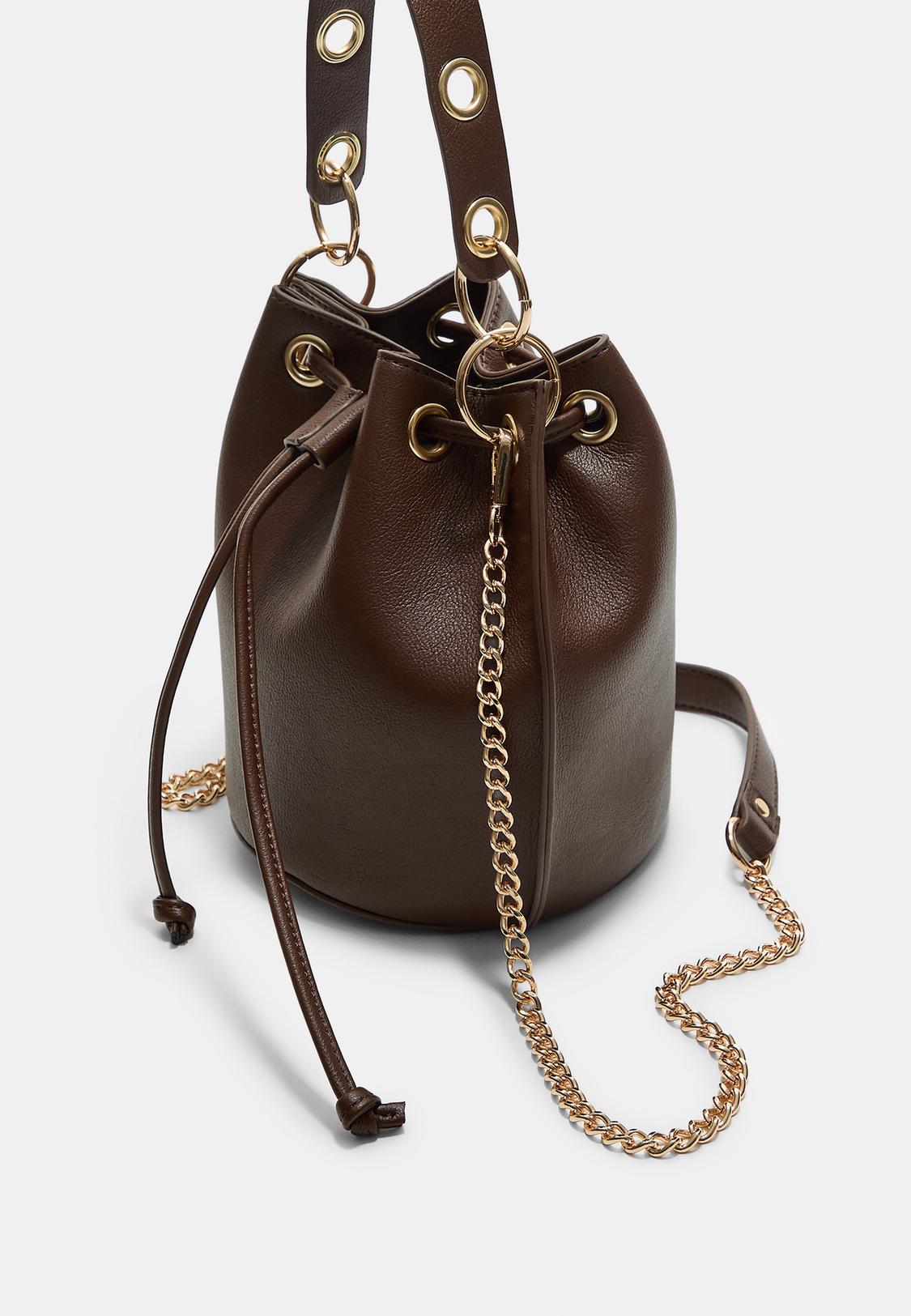 Bolso bandolera bucket ojales Stradivarius Nicaragua