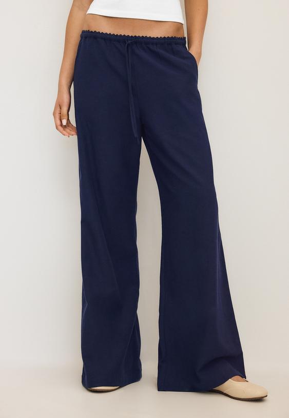 pantaloni gamba larga effetto lino