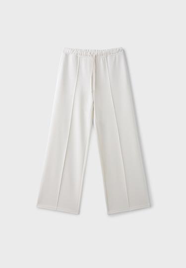 Soft-touch wide-leg jogger trousers with pin tuck — Vanilla 7