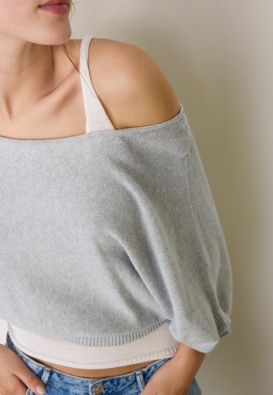 maglia a barchetta con sovrapposizione